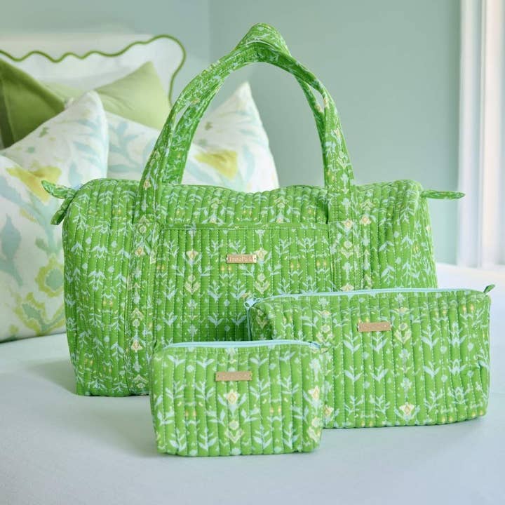 Petal Garden Green Signature Duffel Bag shown with other bags in collection