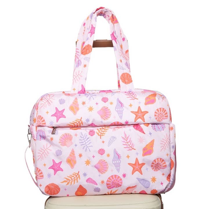 Beach Seashells Weekend Bag has a luggage passthrough sleeve