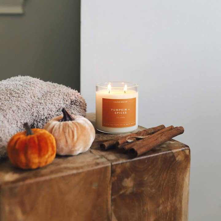 Pumpkin + Spices clear glass tumbler candle with two wicks and 8.8 oz. natural soy wax