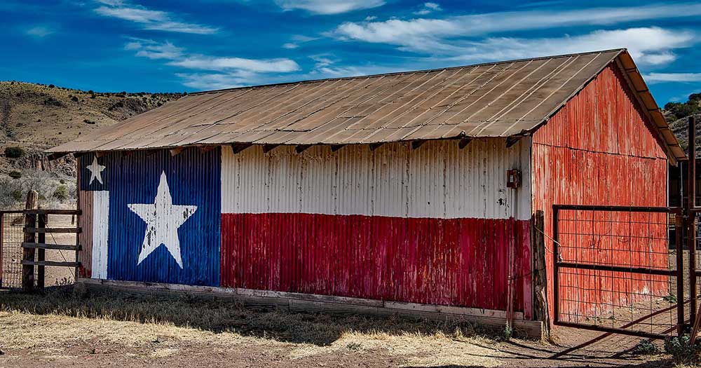 Texas flag painted on side of rustic barn for the Made In Texas Collection