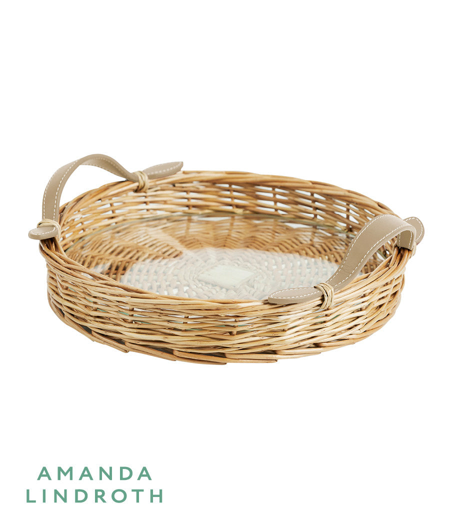 Island Tray Round-Small made from rattan with a glass insert. From Amanda Lindroth