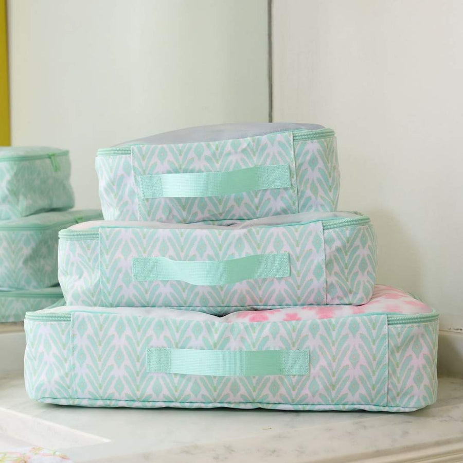 Petite Frond Mint Packing Cubes includes a 12"x16" travel laundry bag