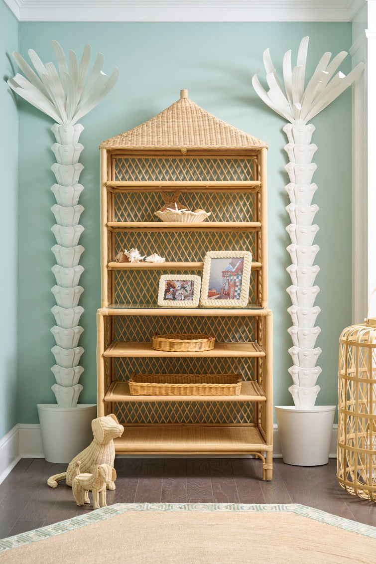 Little Potcake by Amanda Lindroth is a natural rattan weave dog figure. Displayed with collection