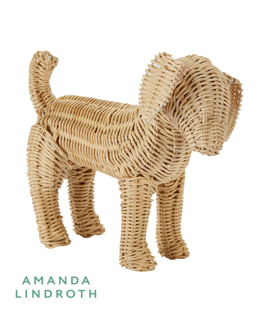 Little Potcake by Amanda Lindroth is a natural rattan weave dog figure.