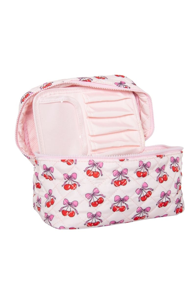 Cherry Bows Repeat Makeup Bag has brush inserts
