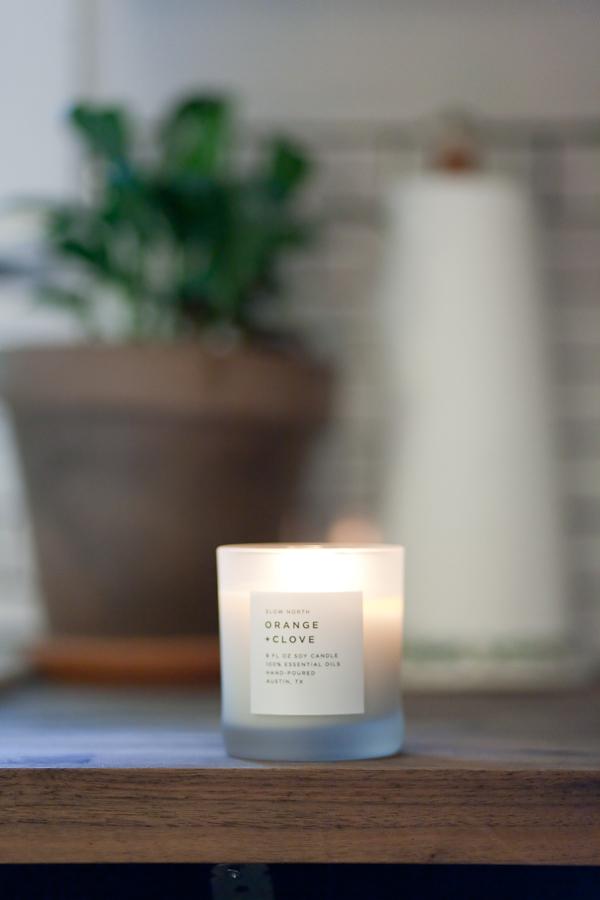 Slow North 100% Orange and Clove essential oil wax candle lifestyle image