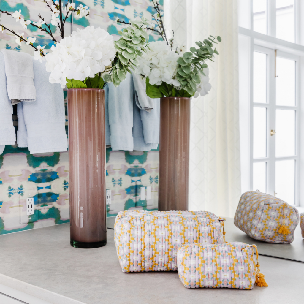 Chloe Lavender Quilted Cosmetic Bag from Laura Park Designs in yellows and lavender lifestyle image