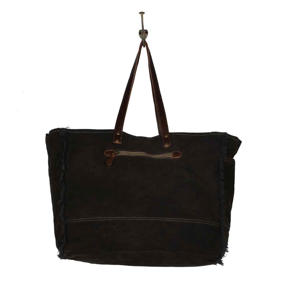 Everyone's Distraction Weekender Bag On Hook Back View Image Myra Bag Harley Butler Trading Company