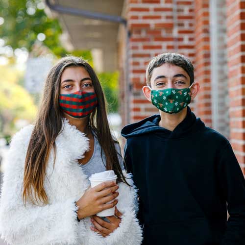 Reindeers & Snowflakes kid's face mask red-nose reindeers and snowflakes siblings in masks