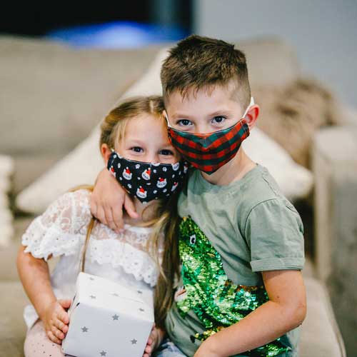 Santa Cat kid's face mask with cats in red caps and paw prints young children