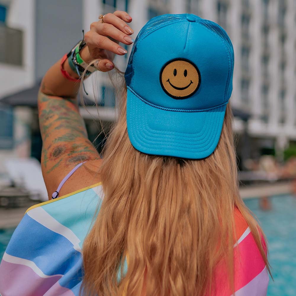 Happy Face Foam Trucker Hat with bright and colorful emoji patch