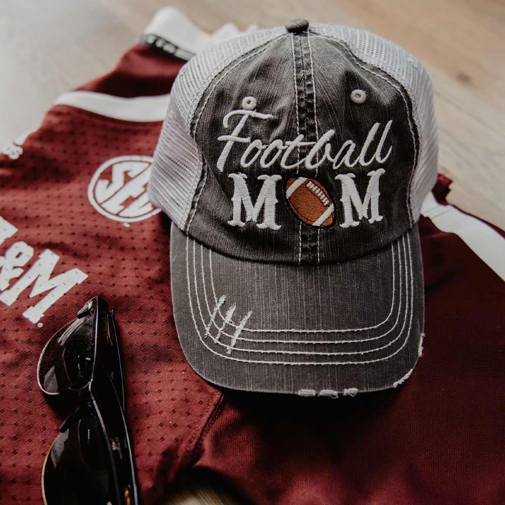 Football Mom Trucker Hat with embroidered football icon, from Katydid
