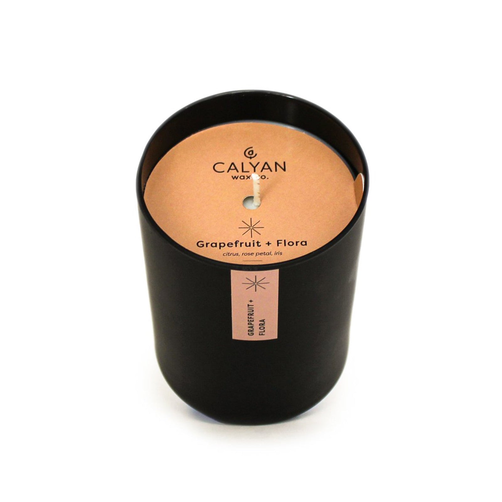 Black matte glass tumbler candle Grapefruit + Flora fragrance from Calyan Wax Company