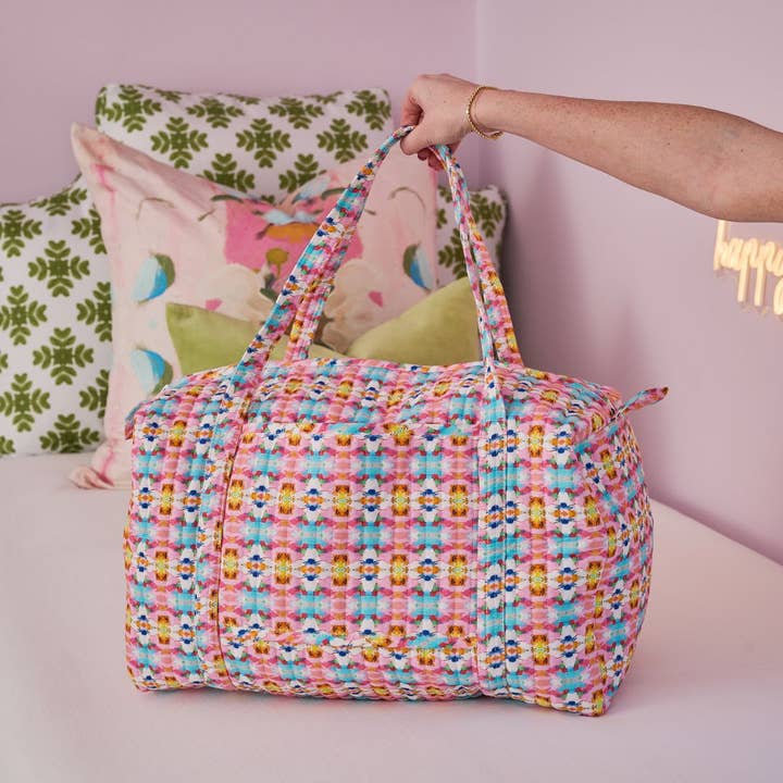 Sumner Pink Weekender Duffel Bag in colorful pinks,  blues, and yellows
