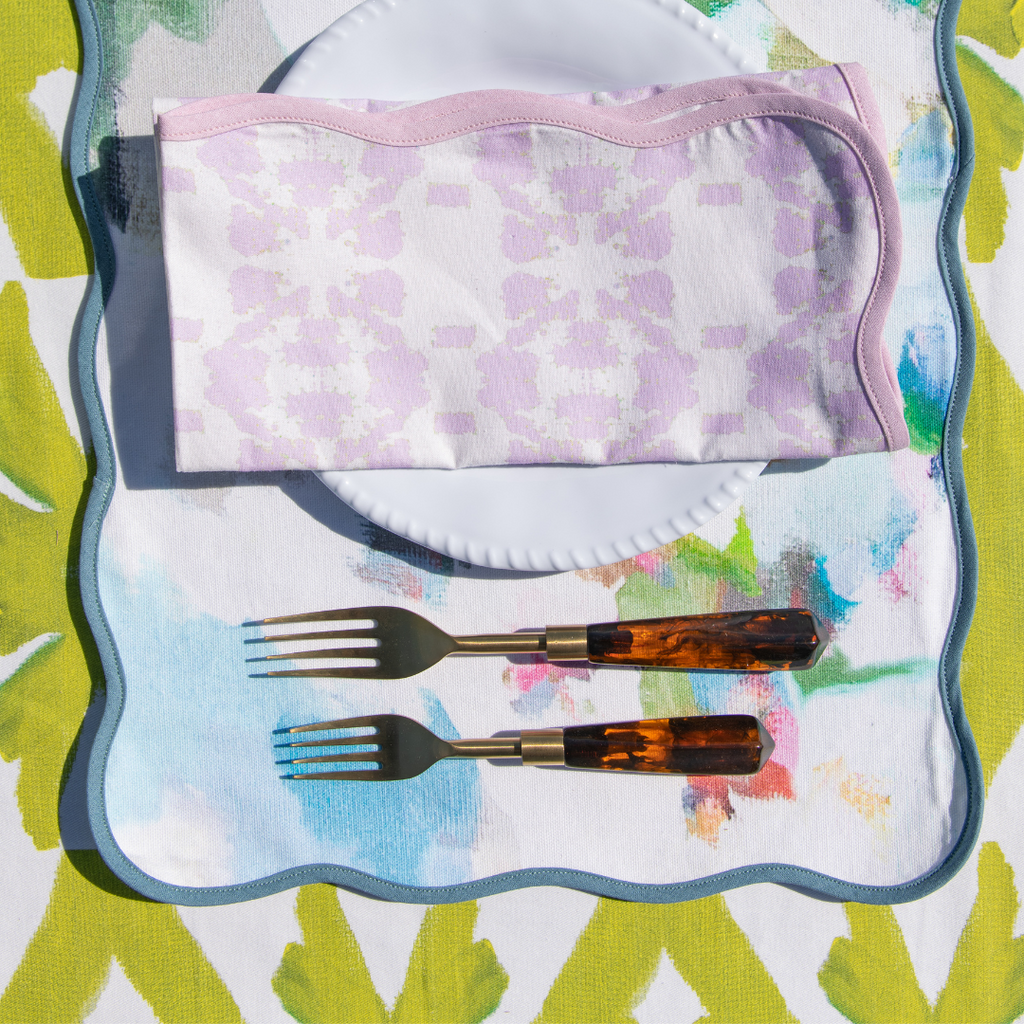 Mosaic Lavender Scalloped Dinner Napkins shown with Park Avenue Placemat