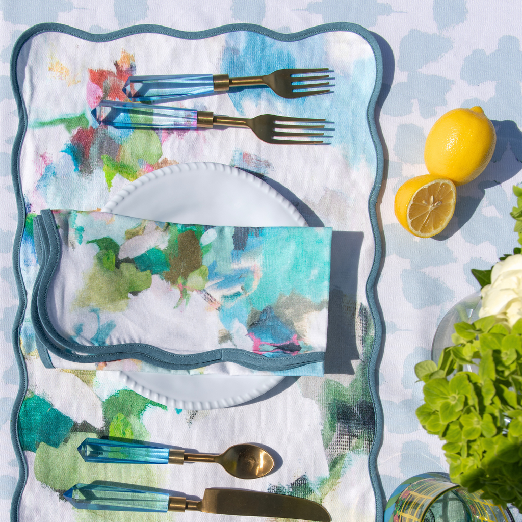 Park Avenue Scalloped Placemats with Blue Acrylic Flatware