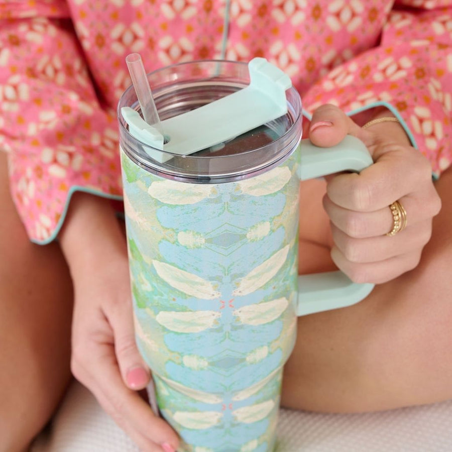 Elephant Falls 40 oz. Tumbler shown with plastic lid and straw