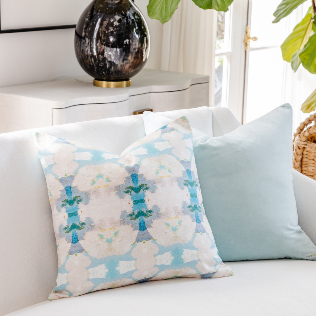 Blue Lagoon Throw Pillow shown with Signature Blue pillow