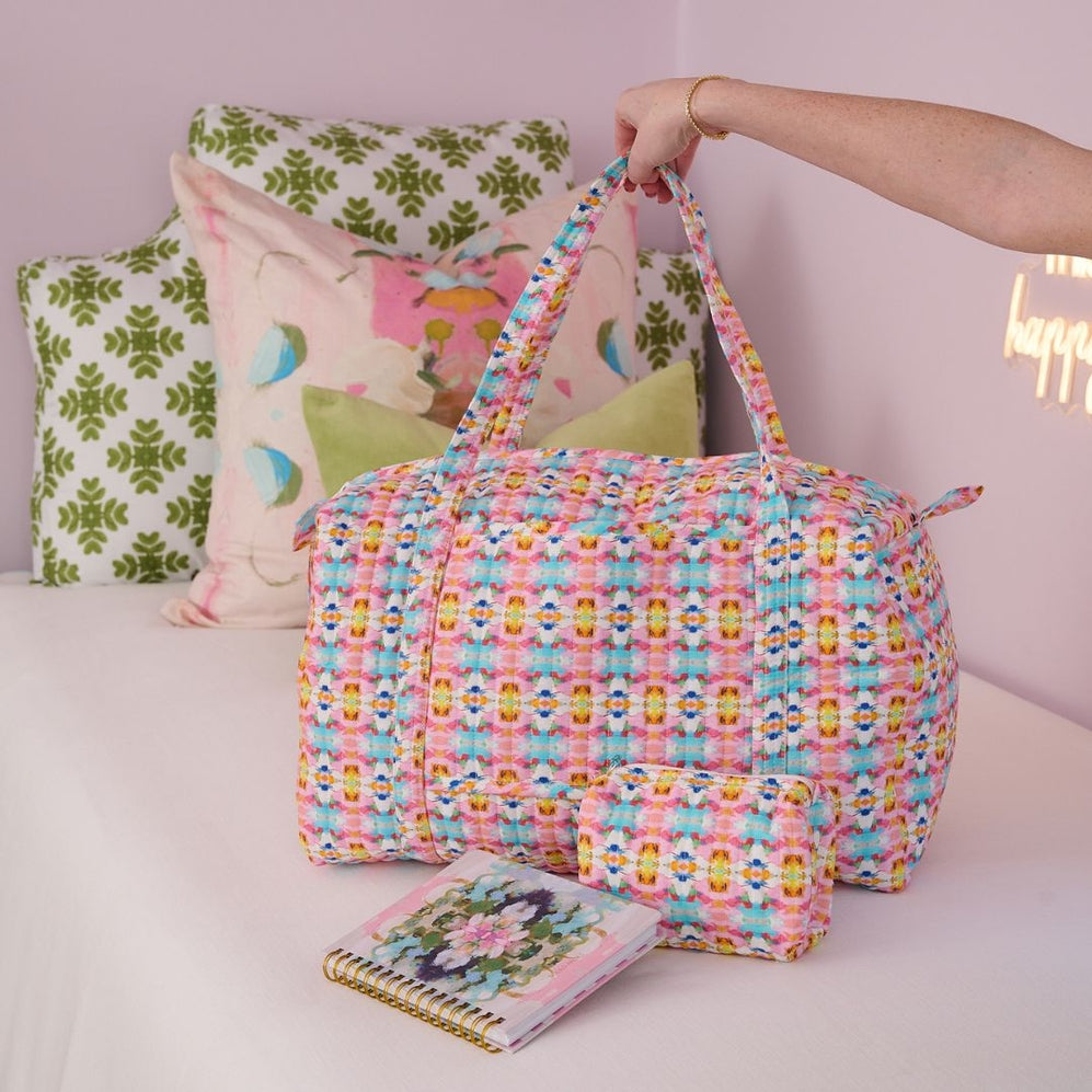 Sumner Pink Weekender Duffel Bag shown with matching cosmetic bag