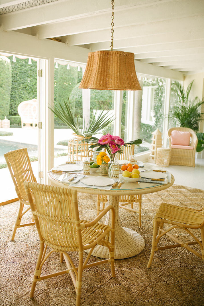 Biscayne Dining Table by Amanda Lindroth shown with various seating pieces