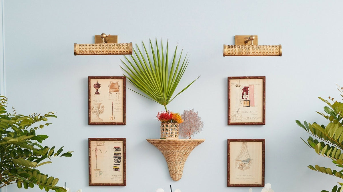 Cane Picture Light from Amanda Lindroth shown on wall display with pictures and bracket