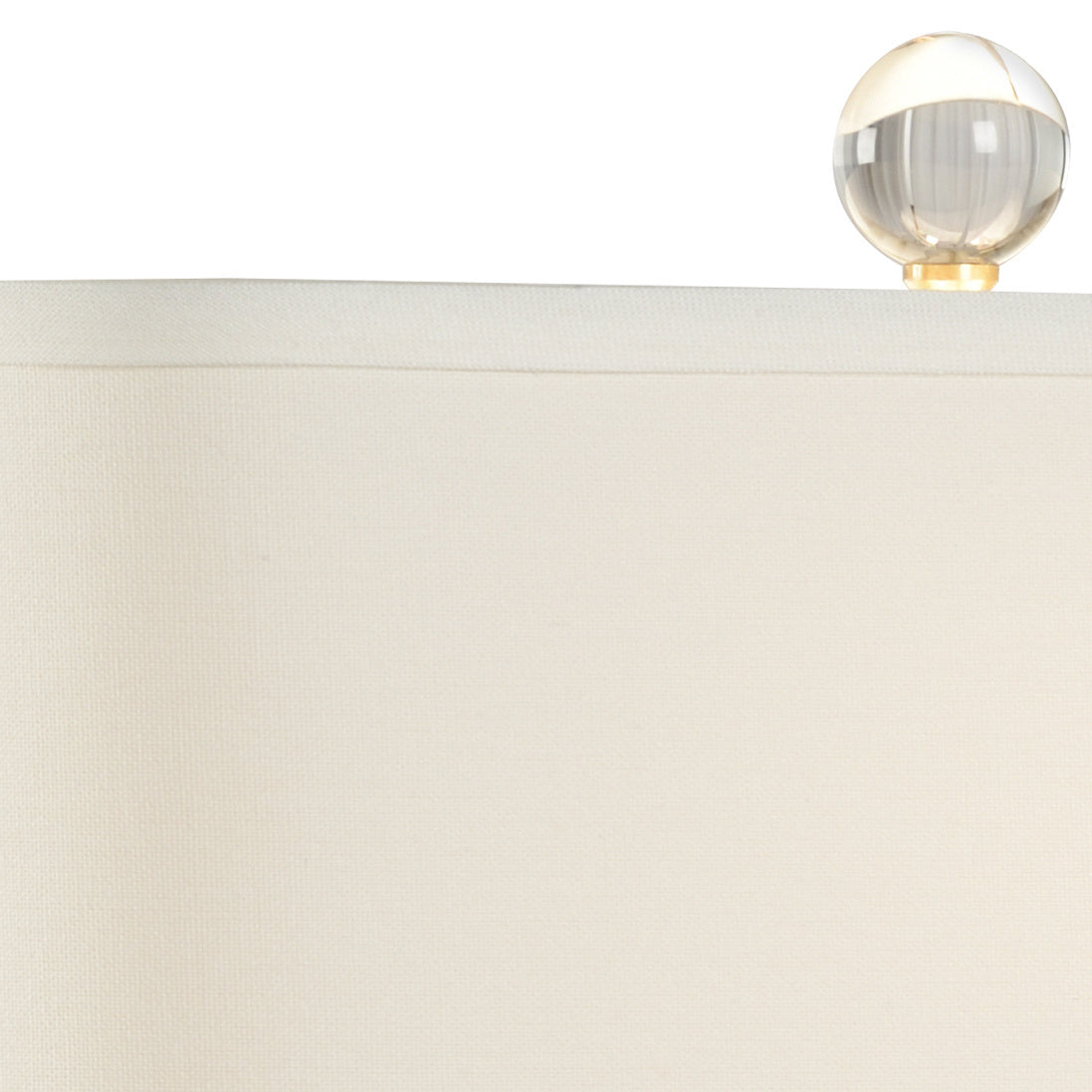 Christal Table Lamp has an off-white linen shade