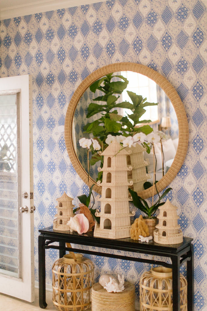 Dunmore Round Wicker Mirror by Amanda Lindroth creates a grand scale focus