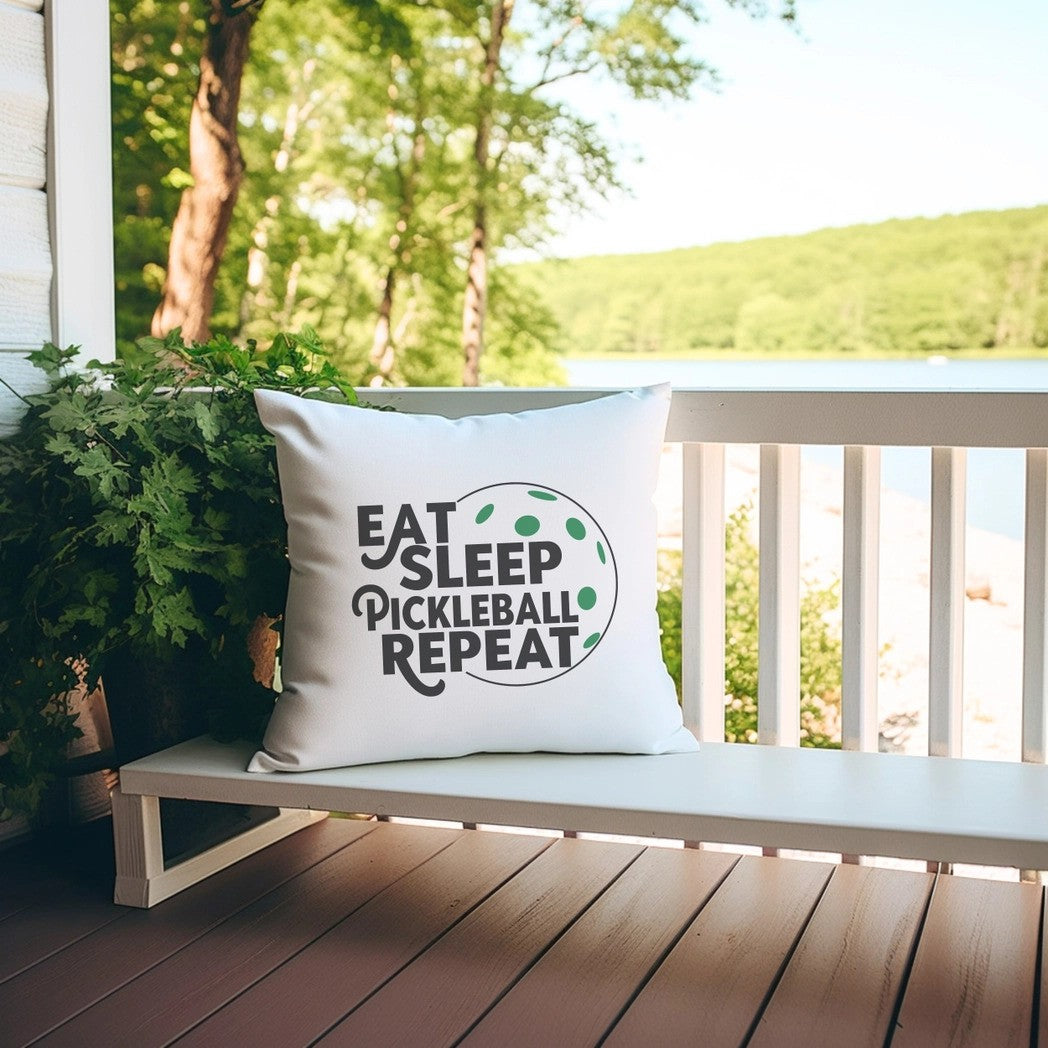 Eat Sleep Pickleball Throw Pillow shown in scenic setting