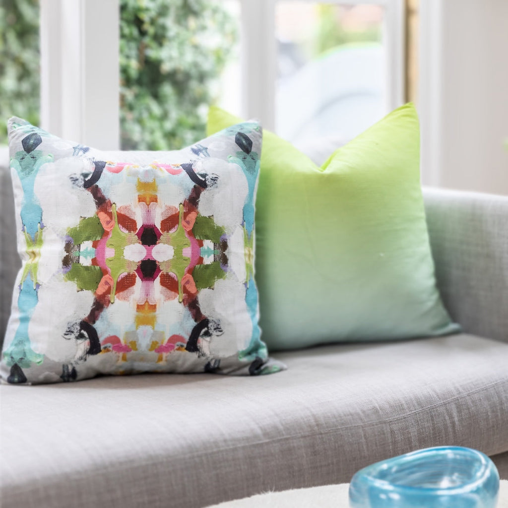 Summer Garden Red Throw Pillow in sofa display