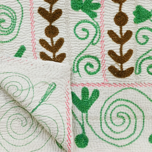 Green ivy Vintage Suzani Blanket is hand-stitched