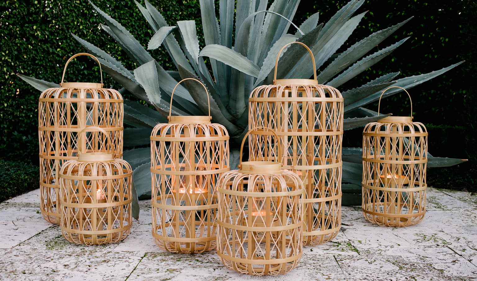 Harbour Island Lantern-Large shown with other Harlbour Island lanterns in various sizes.