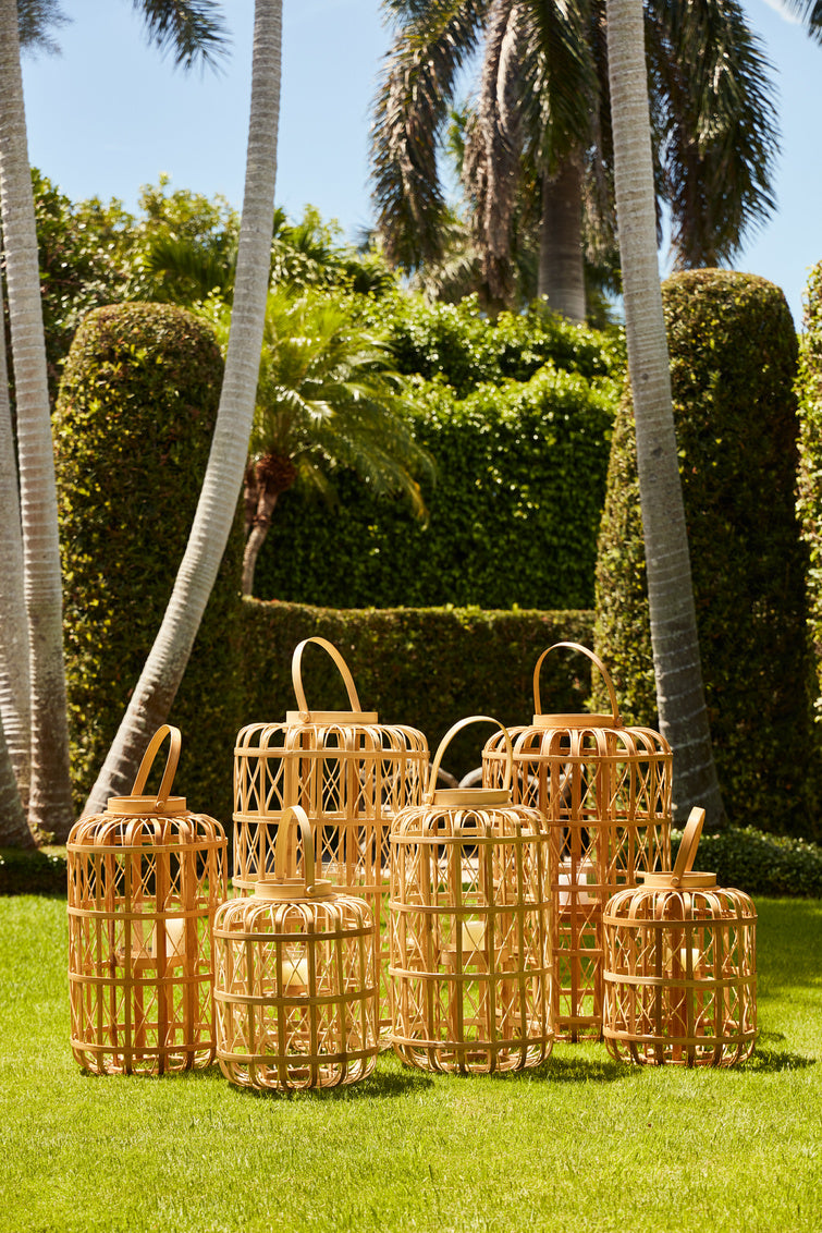 Harbour Island Lantern-Medium shown with other lantern sizes on tropical lawn