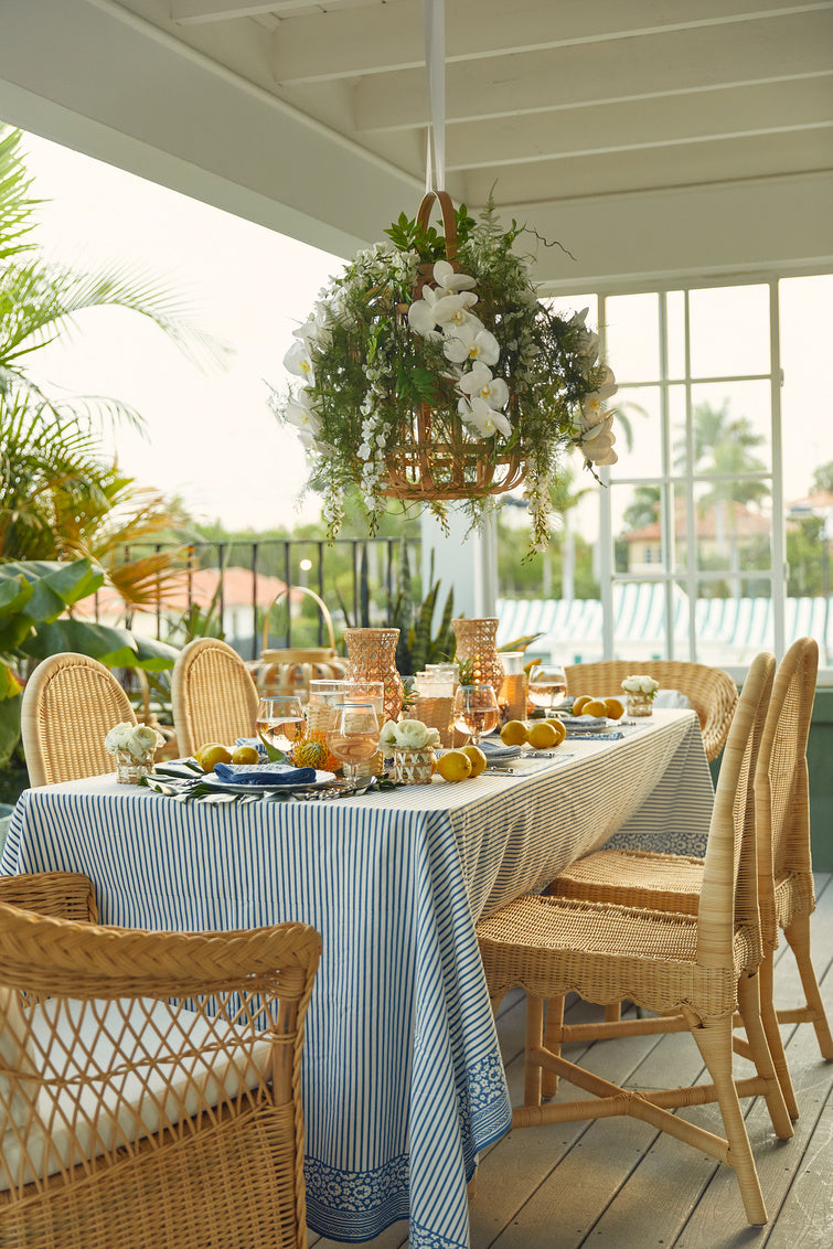 Harbour Island Lantern-Small displayed in outdoor dining setting. Amanda Lindroth
