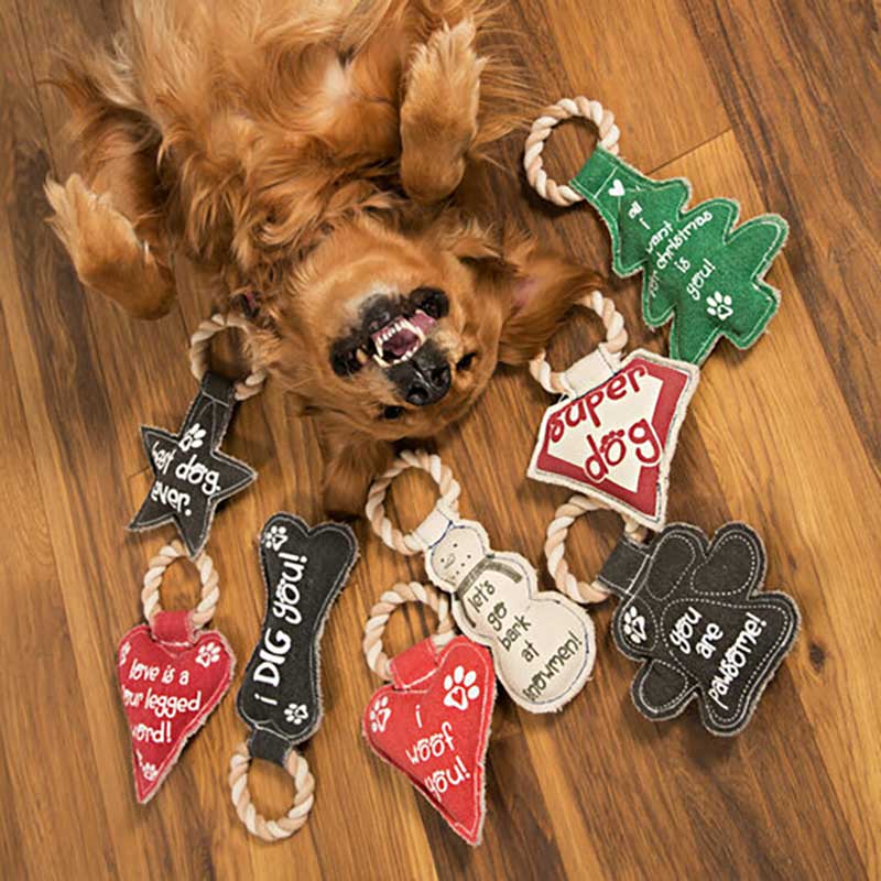 Love Heart Shaped Chew Toy shown with a variety of chew toys