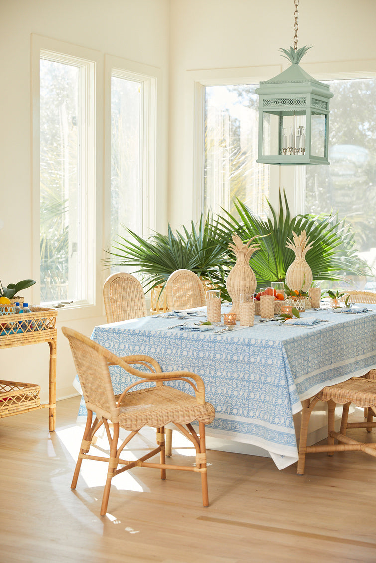 Hope Hill Chair by Amanda Lindroth rattan chair in dining room setting