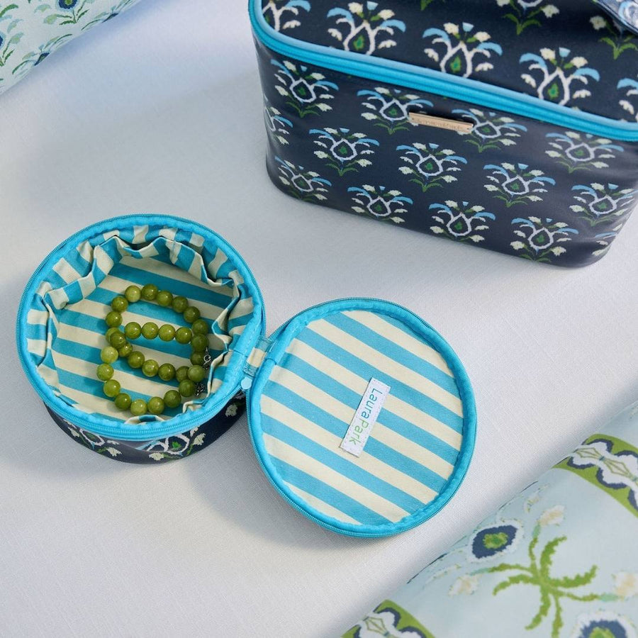 Rosemary Indigo Round Jewelry Case shown with larger Train Case