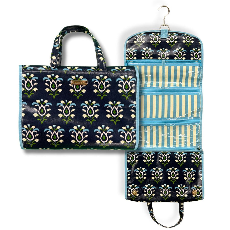 Rosemary Indigo Hanging Travel Case has 4 clear zip compartments