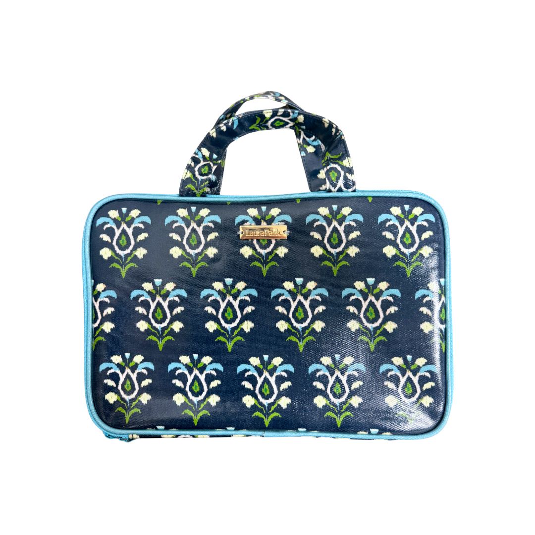 Rosemary Indigo Travel Case in indigo blue with blue, white, and green design