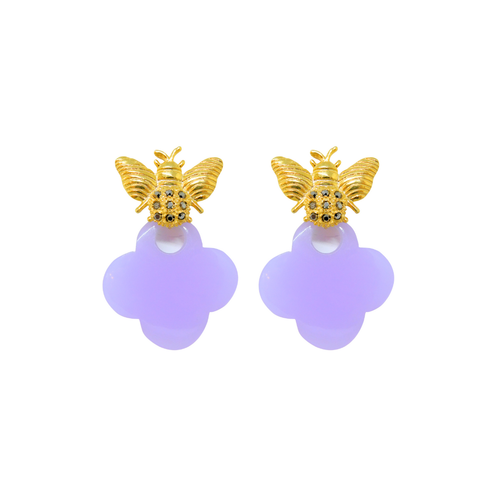 The "Lizzie" Earrings are gold-plated bee shape studs with lavender gemstone stingers