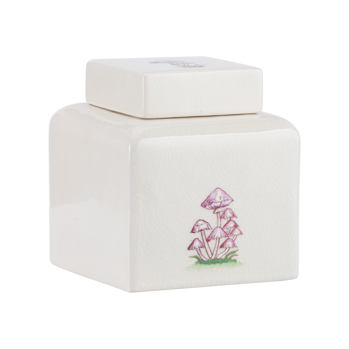 Mushroom Jar - Small has whimsical hand-painted mushrooms on creamy glaze