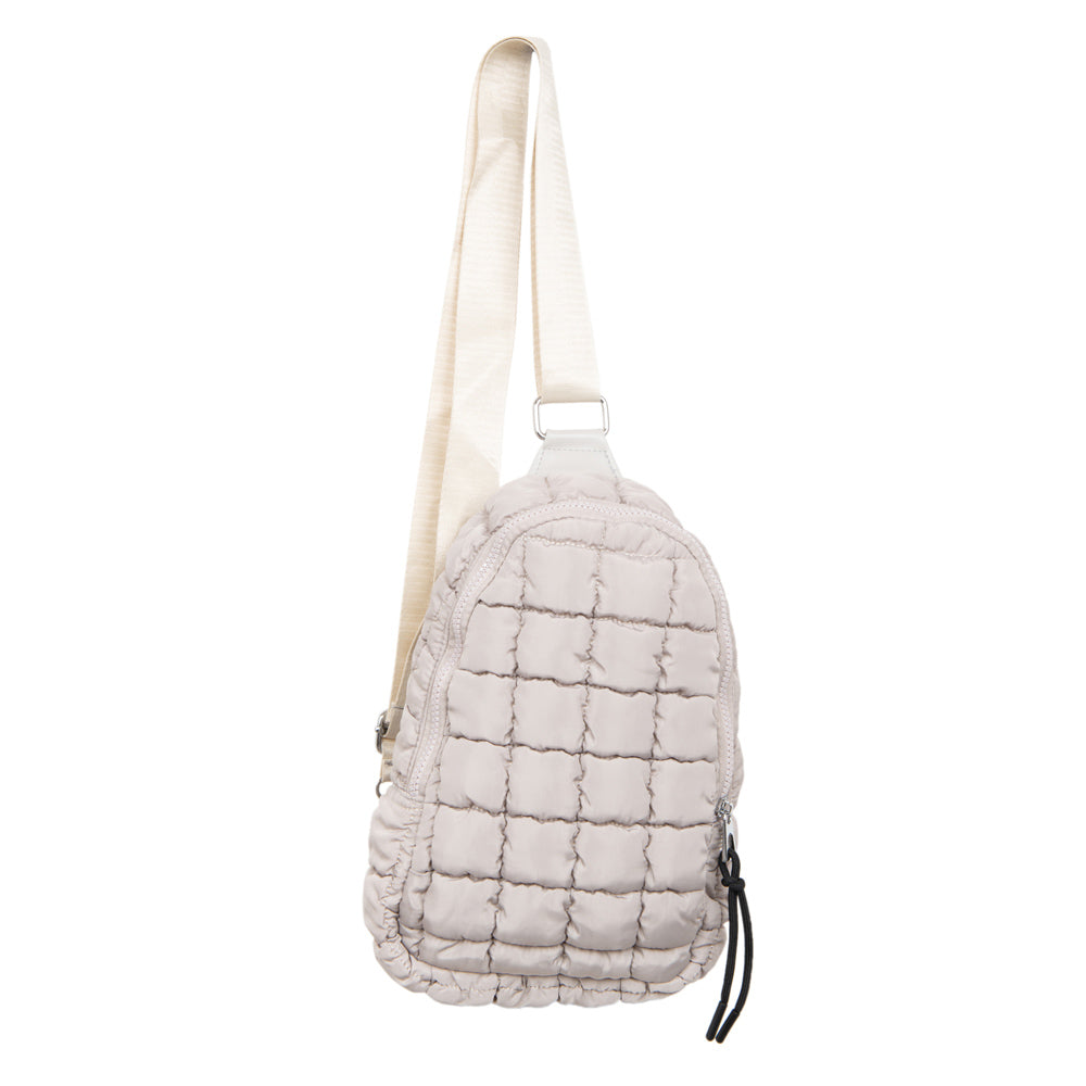 Sand Quilted Sling Bag has an interior pocket