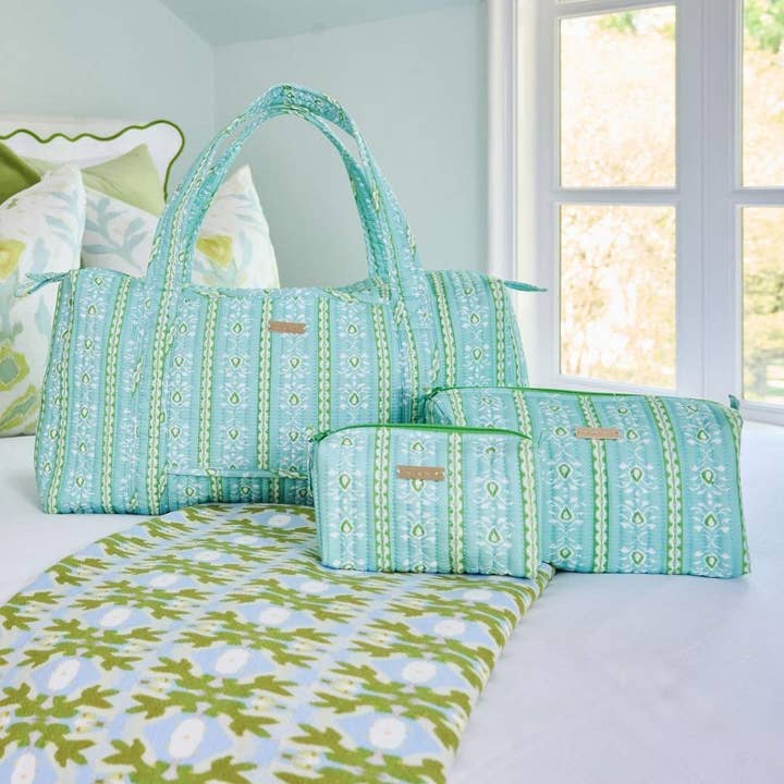 Rosemary Striped Blue Signature Duffel Bag shown with complementing accessories