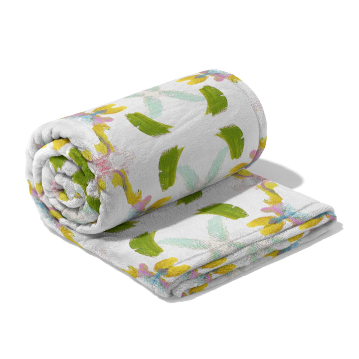 Dogwood Fleece Blanket in pinks, blues, and greens