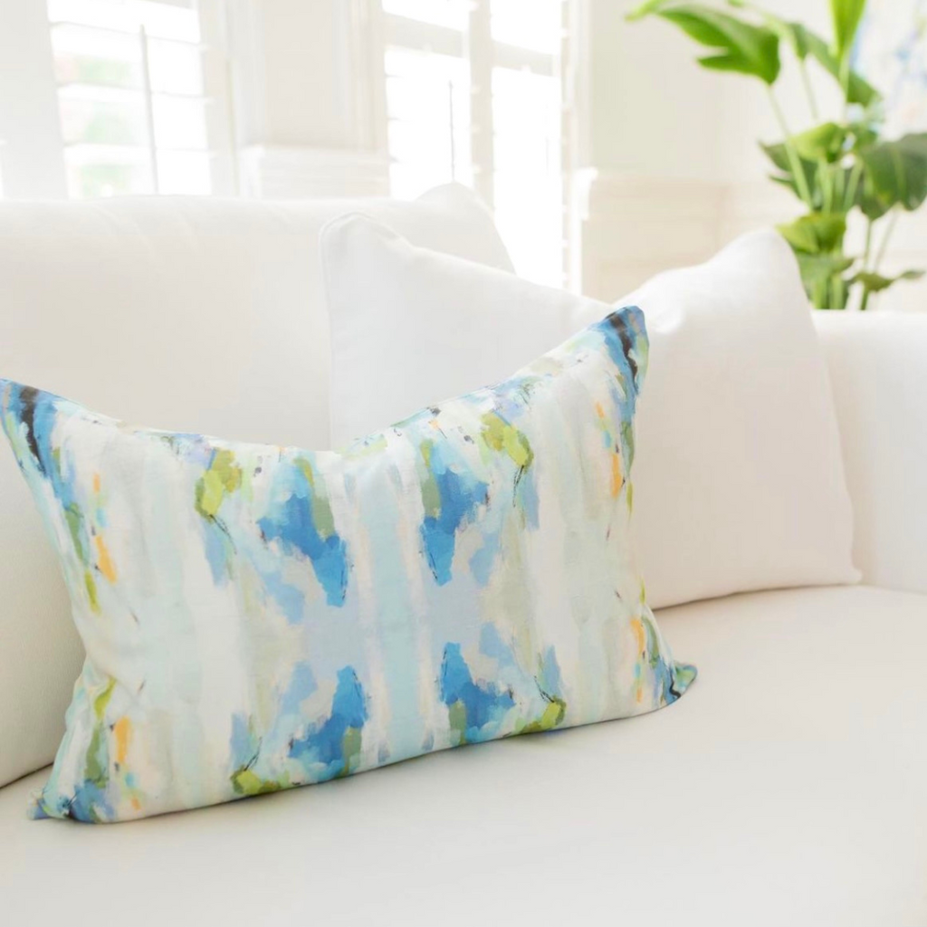 Wintergreen Throw Pillow accents a simple white sofa display