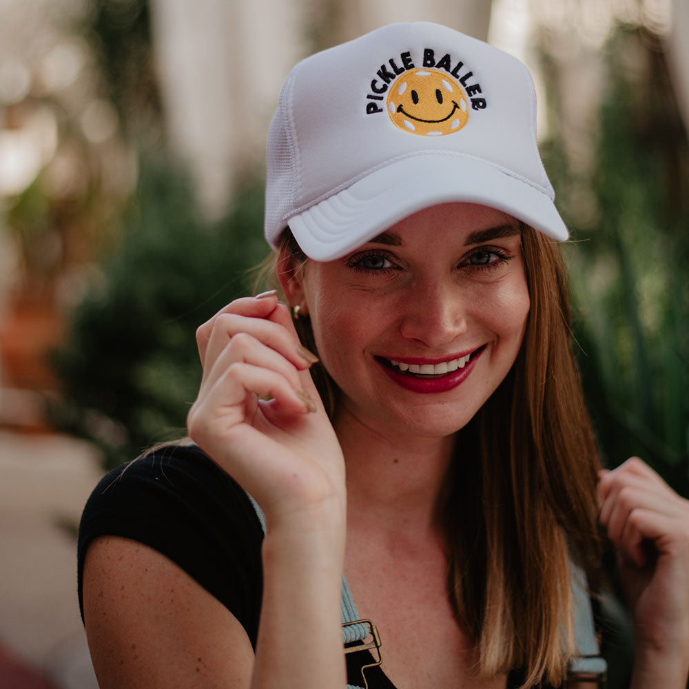 Pickle Baller Foam Trucker Hat with smiling happy face emoji in white