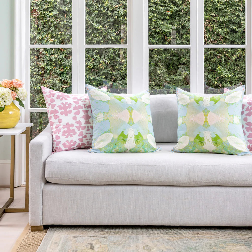 Elephant Falls Throw Pillow in sofa display with Chintz Rose pillows