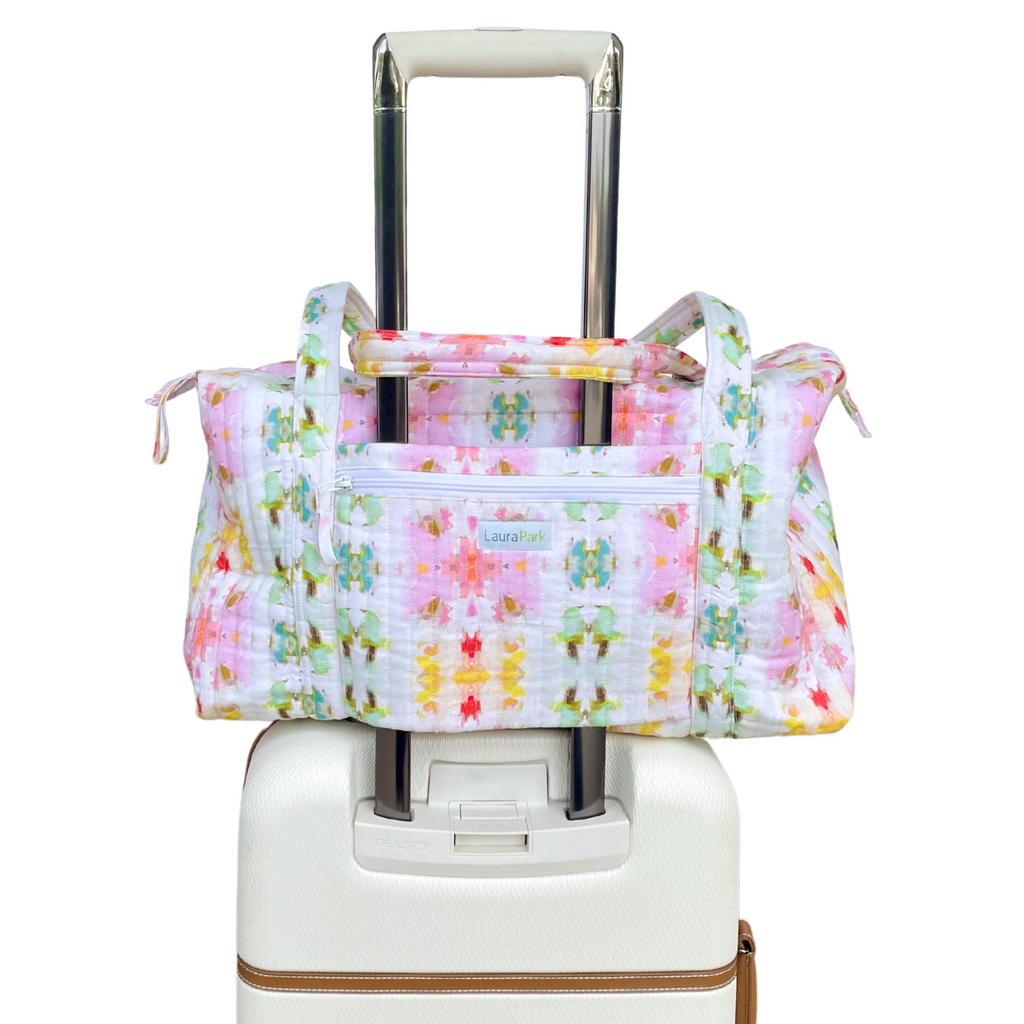 Giverny Weekender Duffel Bag has a trolley sleeve to secure over your luggage handle