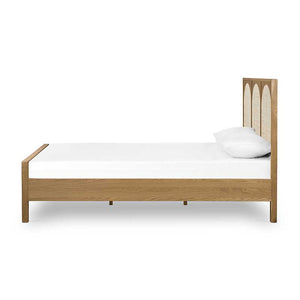 Allegra Bed oak frame with light cane detailing from Four Hands King and Queen side view