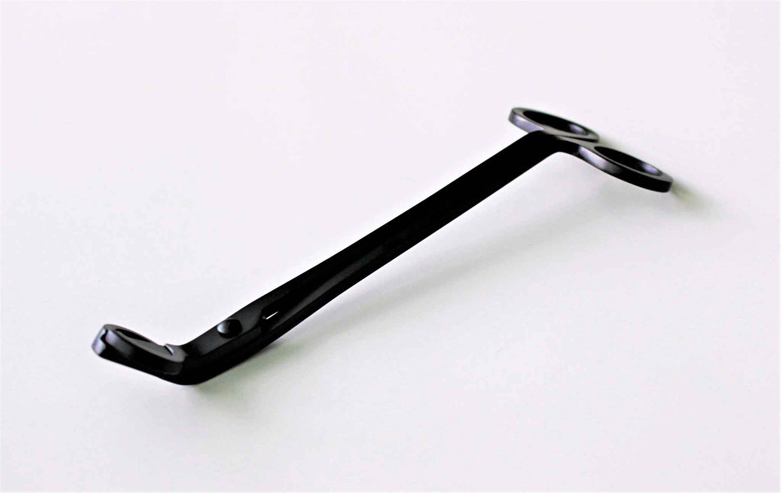 Black wick trimmer with angled cutting head from Calyan Wax Co.