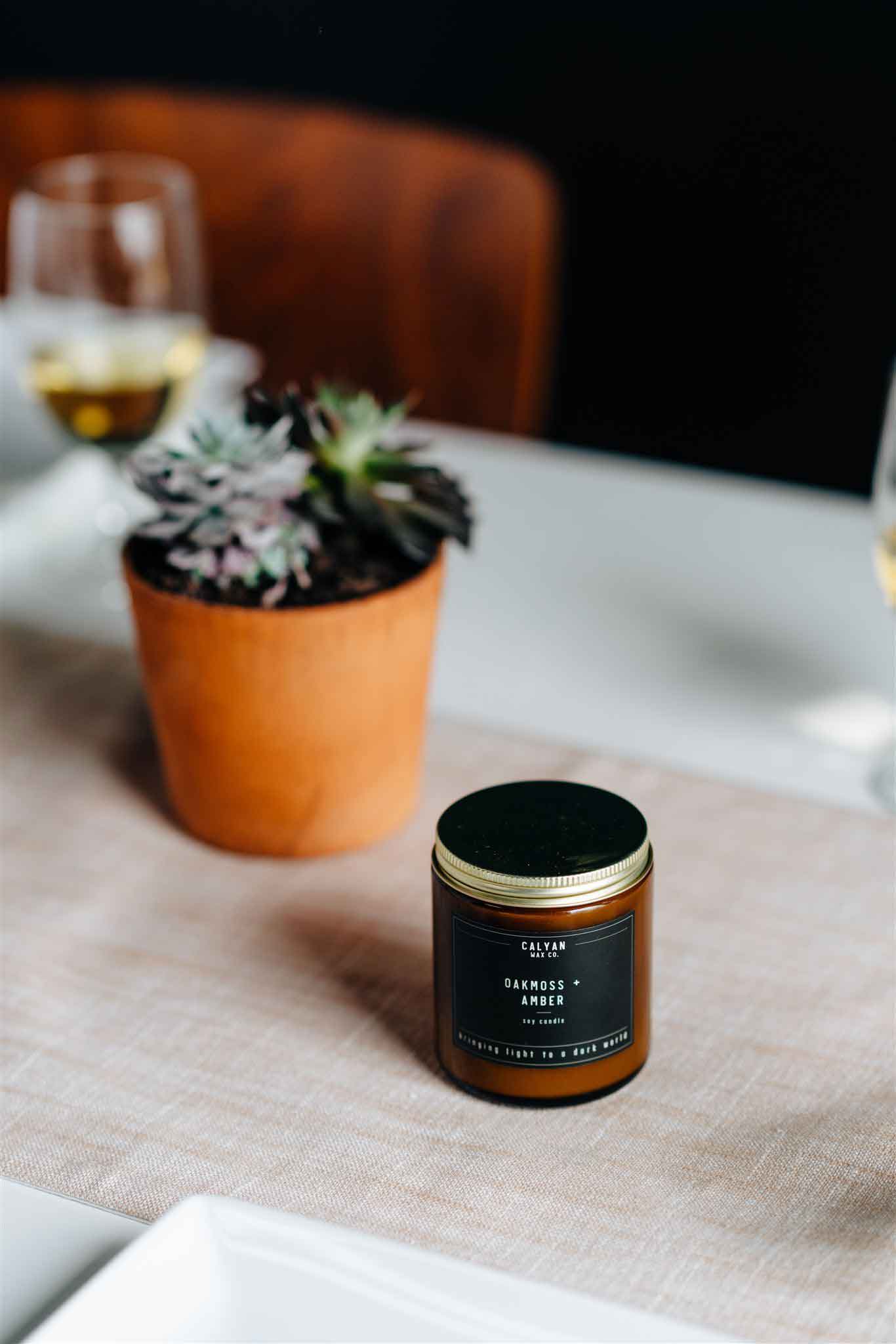 Amber Jar Candle with Bronze Lid Oakmoss & Amber Lifestyle Image Calyan Wax Co.